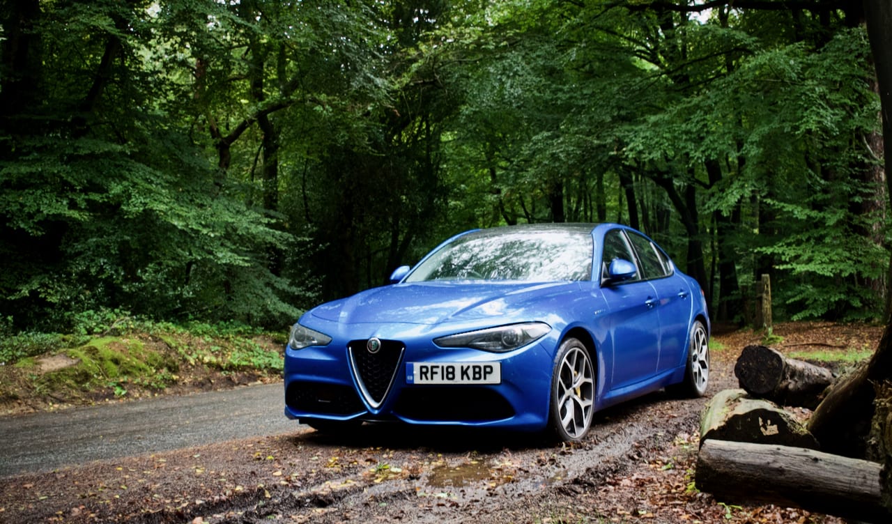 Alfa Romeo Giulia in a forest